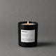 Vela aromática Intimacy de Mittérium encendida, vaso negro de 230 g