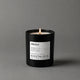 Vela aromática Nostalgia de Mittérium encendida, vaso negro de 230 g